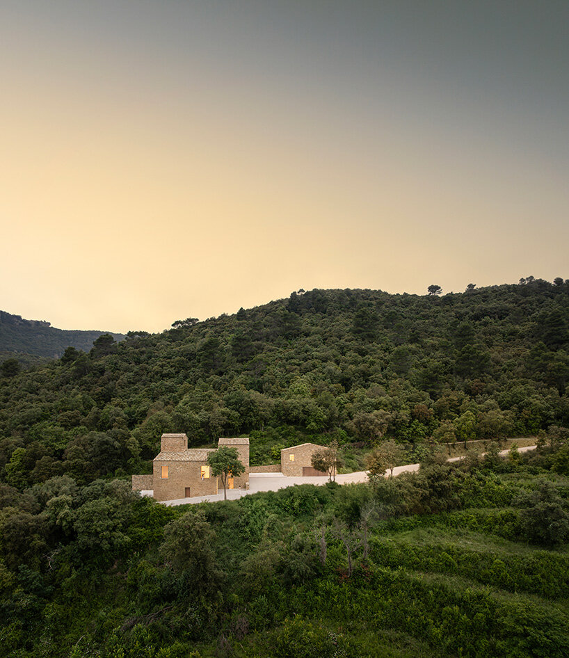 fran silvestre restores limestone farmhouse in spain as off-grid home and workspace