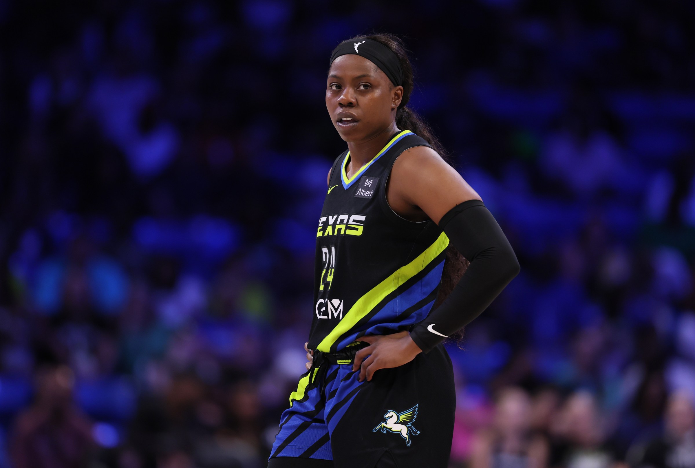ARLINGTON, TEXAS - AUGUST 10: Arike Ogunbowale #24 of the Dallas Wings looks on during the first half against the Washington Mystics at College Park Center on August 10, 2025 in Arlington, Texas. NOTE TO USER: User expressly acknowledges and agrees that, by downloading and or using this photograph, user is consenting to the terms and conditions of the Getty Images License Agreement. (Photo by Sam Hodde/Getty Images)