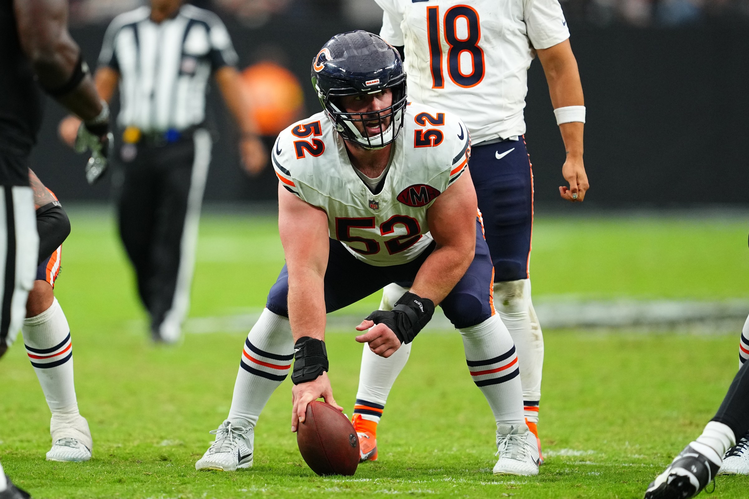 LAS VEGAS, NEVADA - SEPTEMBER 28: Drew Dalman #52 of the Chicago Bears prepares to snap the ball during the second half of a game against the Las Vegas Raiders at Allegiant Stadium on September 28, 2025 in Las Vegas, Nevada. (Photo by Chris Unger/Getty Images)