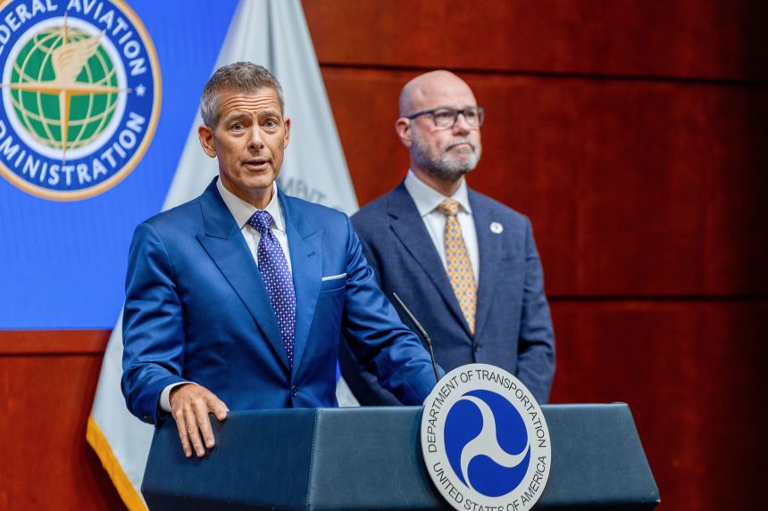 Transportation Secretary Sean Duffy and FAA Administrator Bryan Bedford hold a news conference at the Department of Transportation Headquarters on Wednesday.
