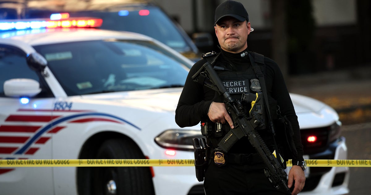 What were the Afghan "Zero Units" that the National Guard shooting suspect reportedly worked for?