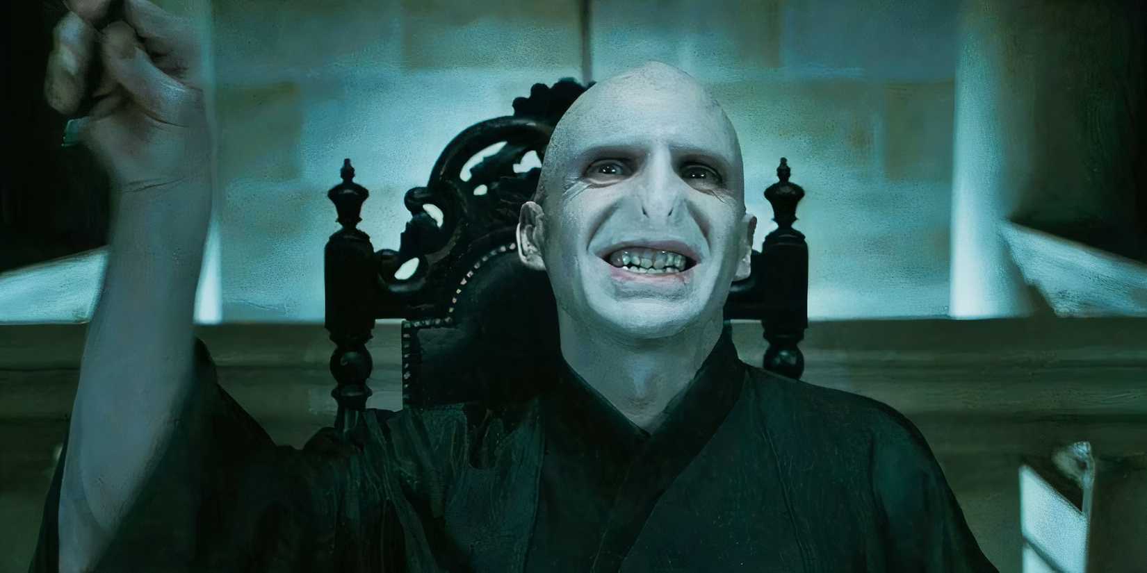 A close-up of a smiling Lord Voldemort in the movie Harry Potter and the Deathly Hallows