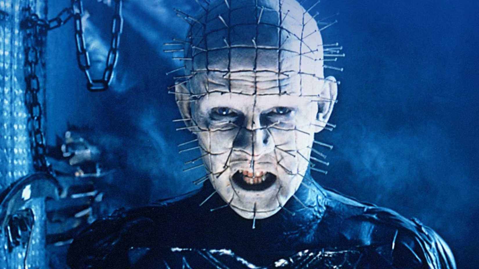 Pinhead grimaces toward the camera in Hellraiser