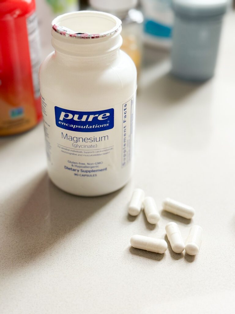 White bottle of Pure Encapsulations magnesium glycinate from iHerb.