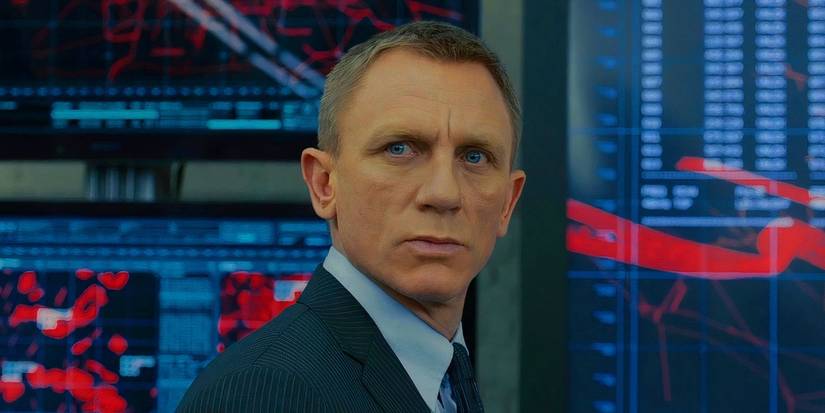 Daniel Craig as James Bond in front of tech in Skyfall (2012)