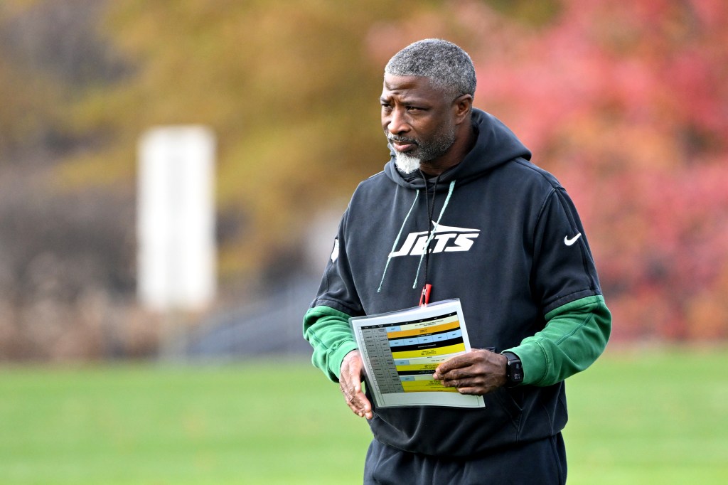 Jets head coach Aaron Glenn looks on during practice.