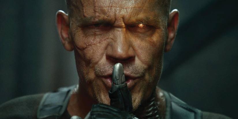 Cable (Josh Brolin) shushes an unseen individual in Deadpool 2.