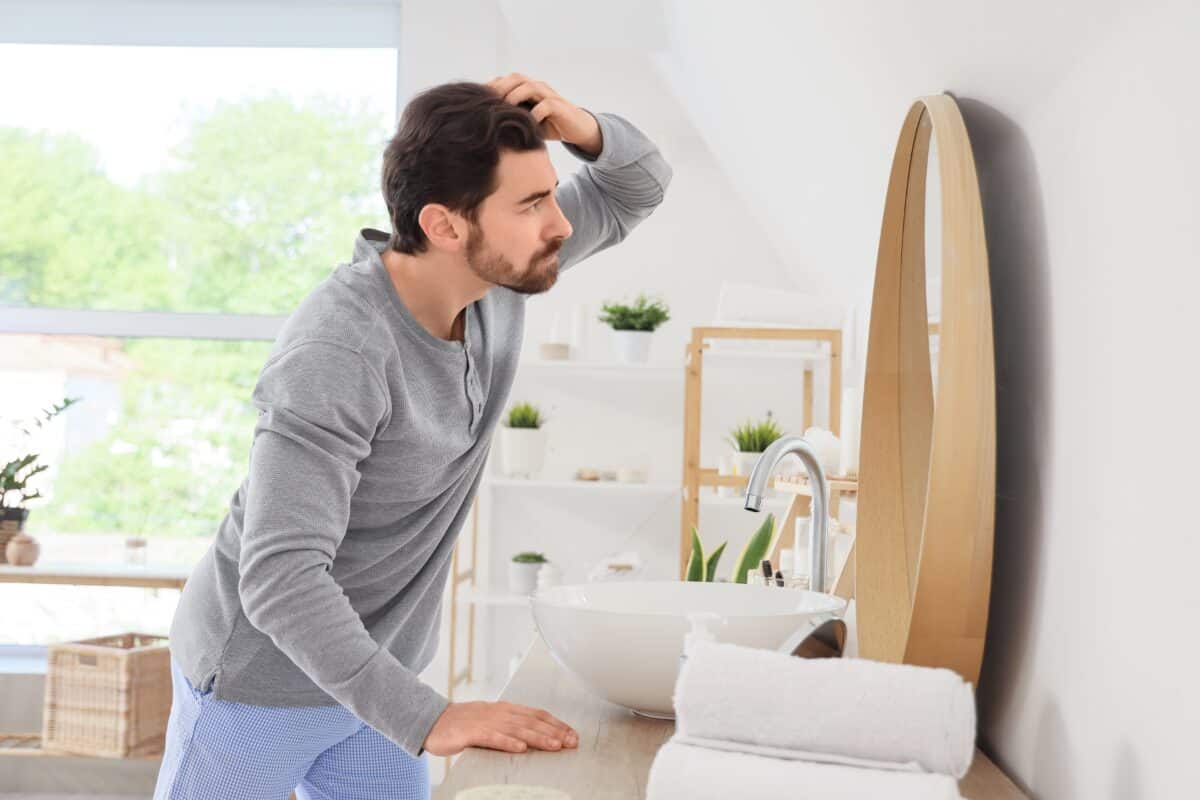 Carcinogens like UV radiation stop hair from graying, allowing damaged cells to linger.