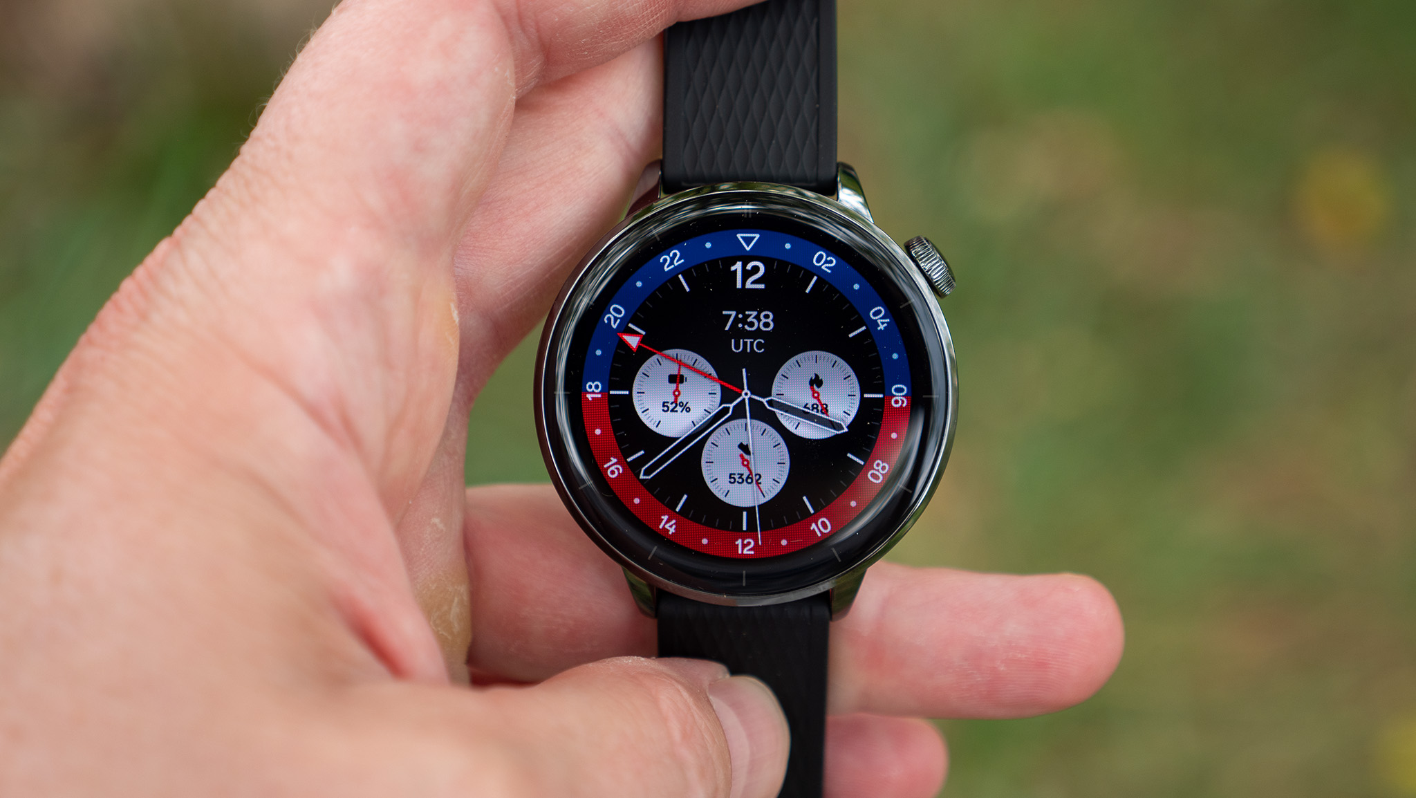 The OnePlus Watch 3 43mm with a red and blue watch face