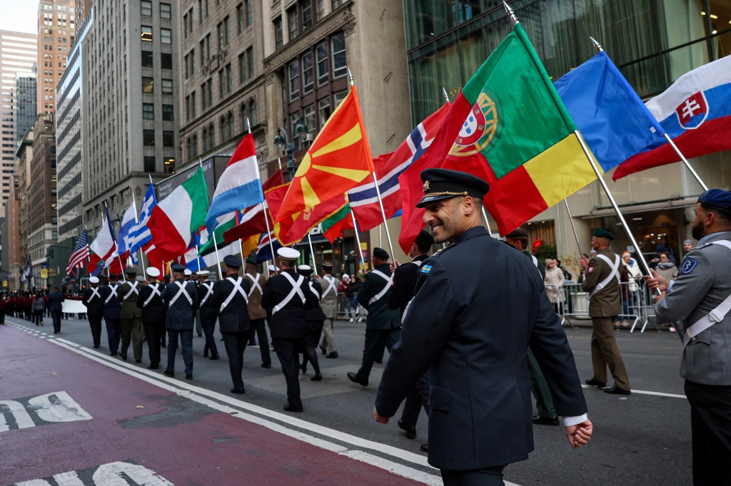 People participate in the 106th annual Veterans Day Parade on November 11, 2025, in New York City. 