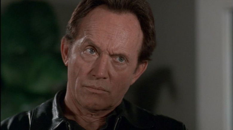 Frank Black (Lance Henriksen) looks up discerningly in Millennium