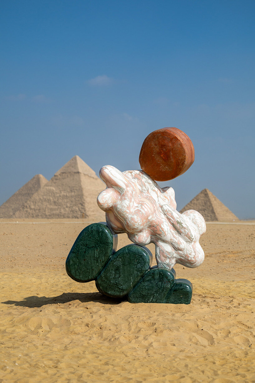 monumental sculptures in marble, onyx, travertine and quartzite emerge at the giza pyramids