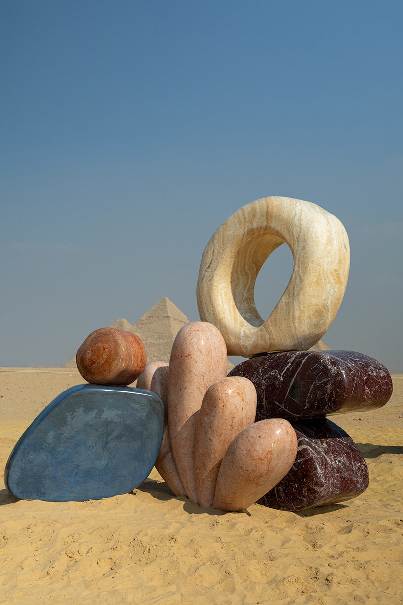 monumental sculptures in marble, onyx, travertine and quartzite emerge at the giza pyramids