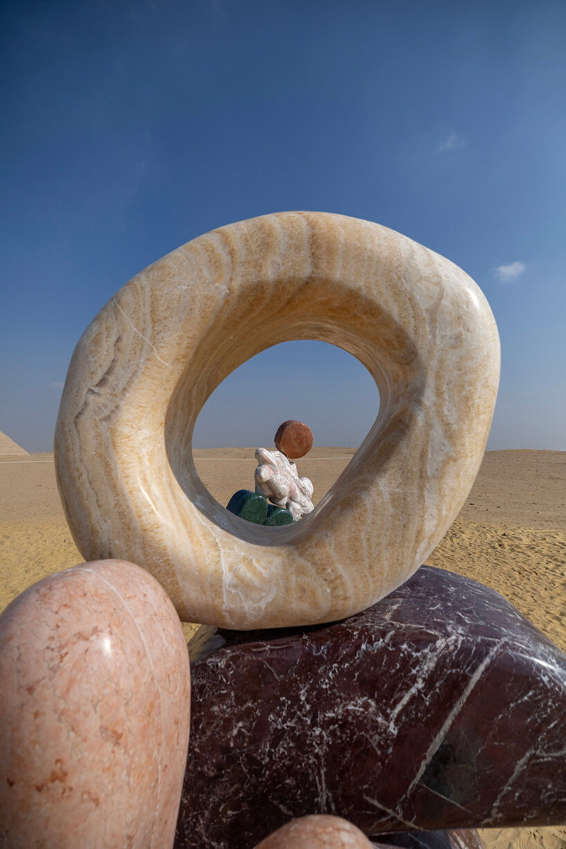 monumental sculptures in marble, onyx, travertine and quartzite emerge at the giza pyramids