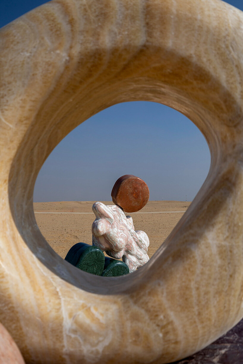 monumental sculptures in marble, onyx, travertine and quartzite emerge at the giza pyramids