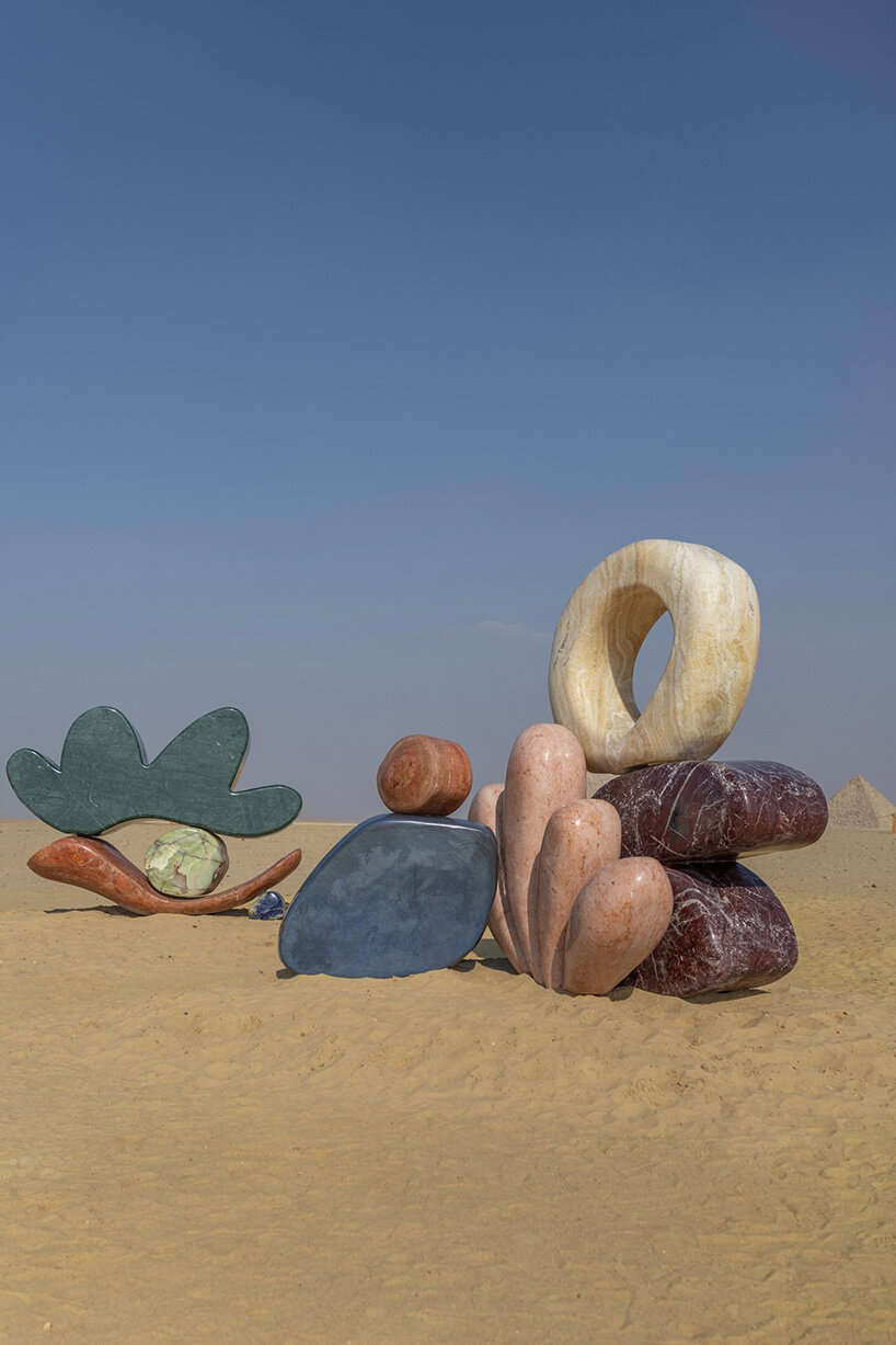 monumental sculptures in marble, onyx, travertine and quartzite emerge at the giza pyramids