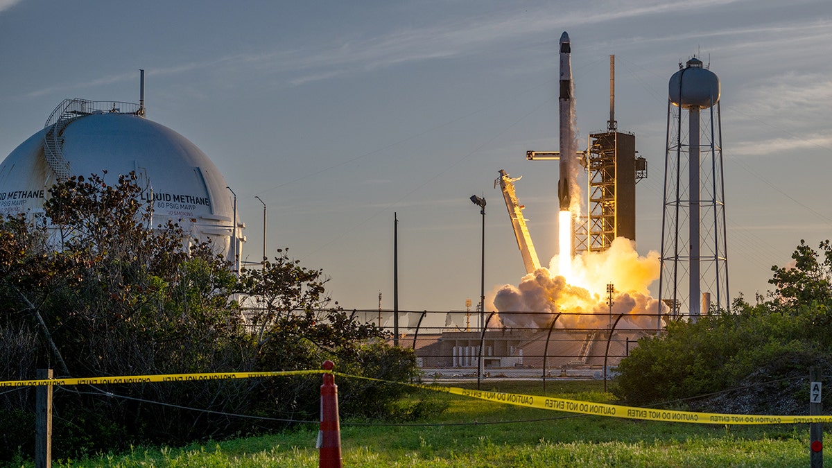 Rocket and spacecraft take off during launch at Kennedy Space Center 