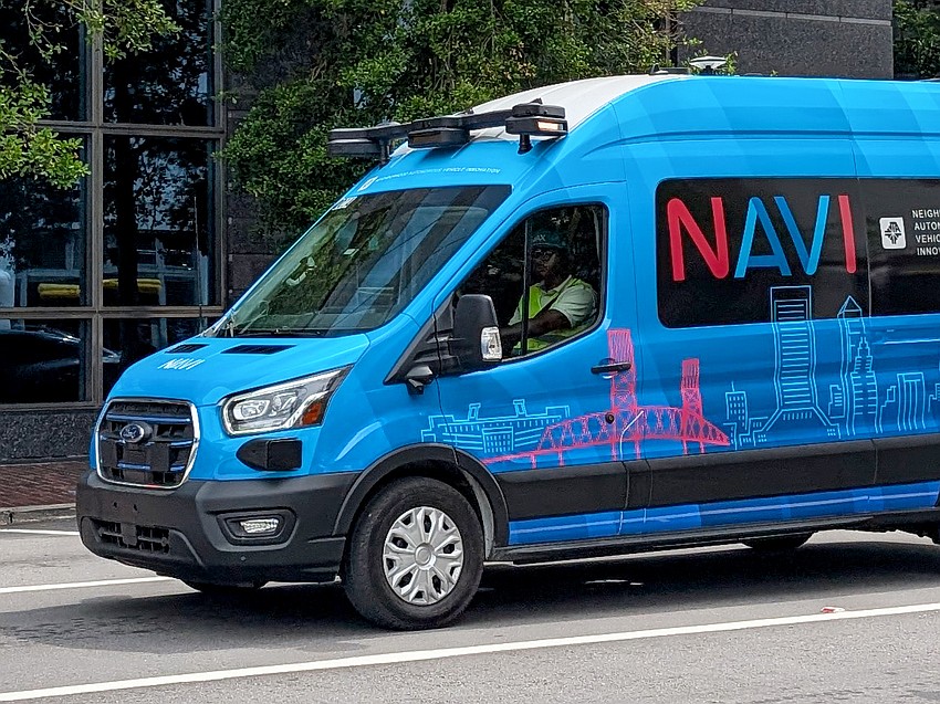 The Jacksonville Transportation Authority's driverless NAVI vans have an attendant that sits behind the wheel. The Jacksonville Transportation Authority's driverless NAVI vans have an attendant that sits behind the wheel.