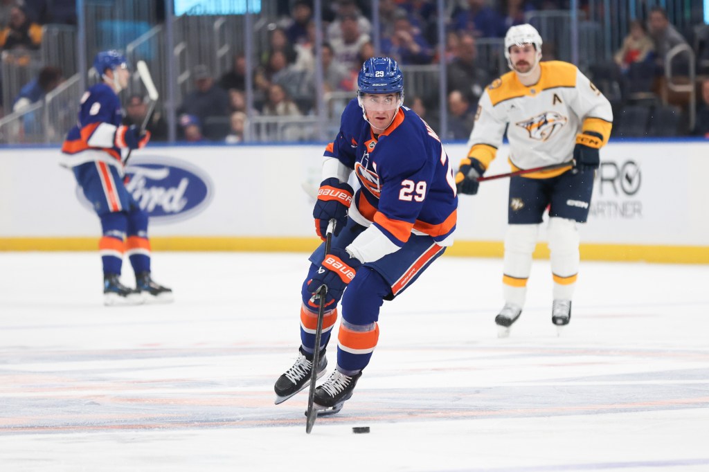 New York Islanders' Brock Nelson #29 handles the puck against the Nashville Predators.