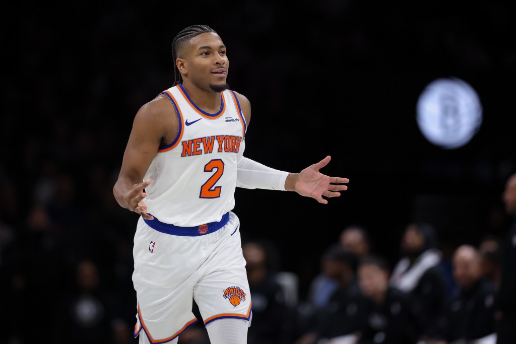 Knicks guard Miles McBride (2) reacts after a basket against the Brooklyn Nets during the second half at Barclays Center. 