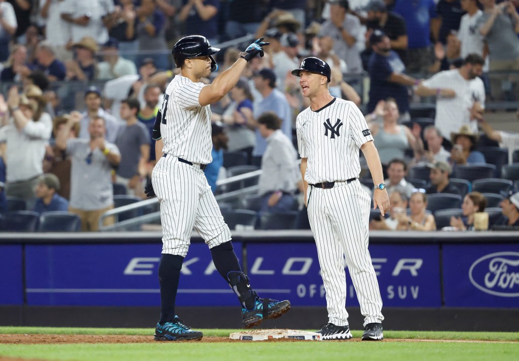 Giancarlo Stanton and Travis Chapman