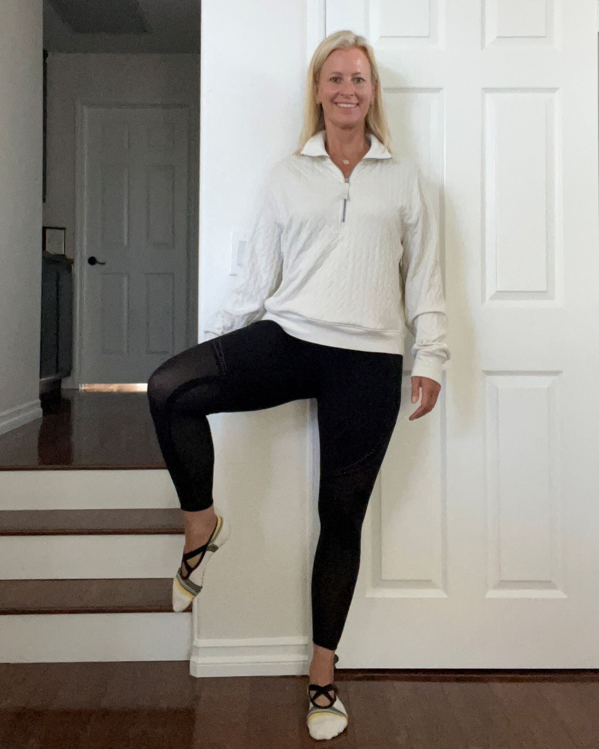 Woman lifting one leg