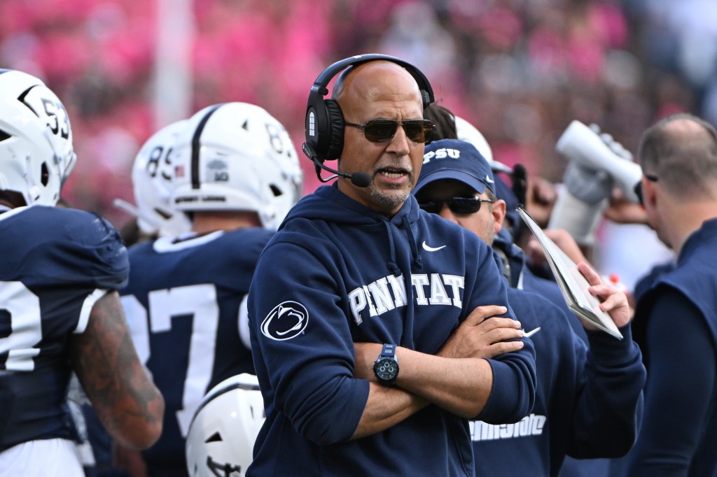 Penn State head coach James Franklin reacts during a college football game.