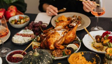 Thanksgiving food on table such as turkey and sweet potato casserole