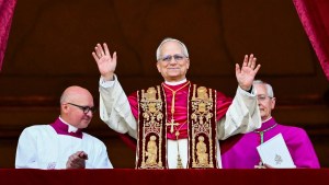 Newly elected Pope Robert Francis Prevost arrives on the main central loggia balcony of the St Peter's Basilica for the first time, after the cardinals ended the conclave, in The Vatican, on May 8, 2025
