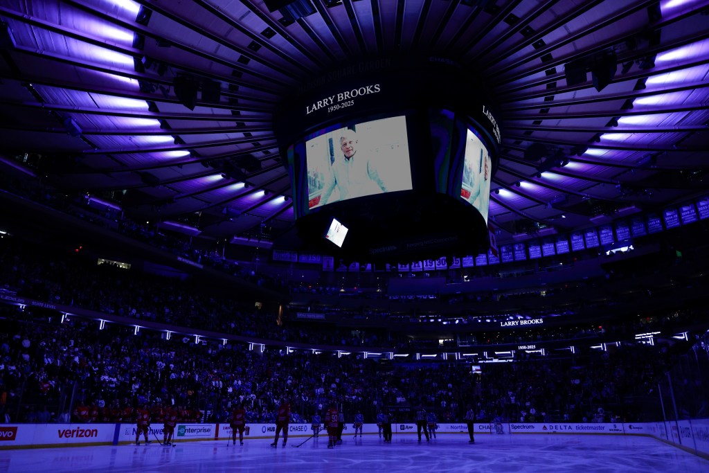 A portrait of Hall of Fame hockey writer Larry Brooks is seen during a moment of silence before the Rangers' game against the Red Wings at MSG on Nov. 16, 2025.