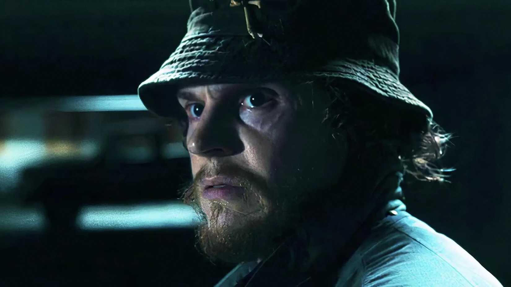 Ralph Bohner wears a hat while undercover in a parking lot in Agatha All Along