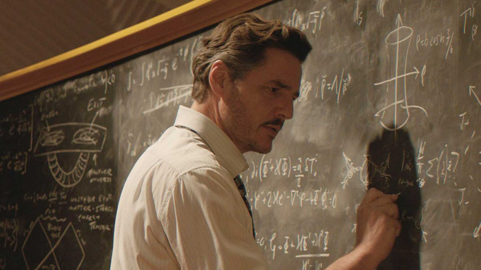 Reed Richards doing calculations on his chalkboard from Fantastic Four First Steps