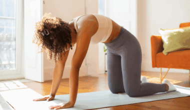 A woman doing cat cow exercise
