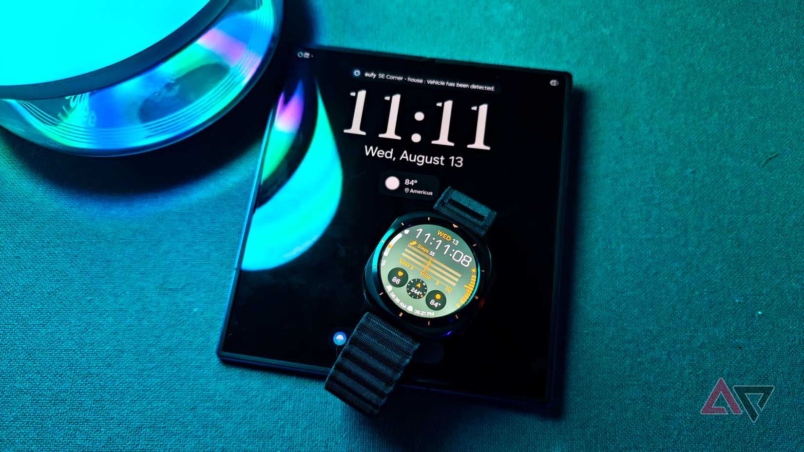 Samsung Galaxy Watch Ultra showing watch face sitting on the Galaxy Z Fold 7