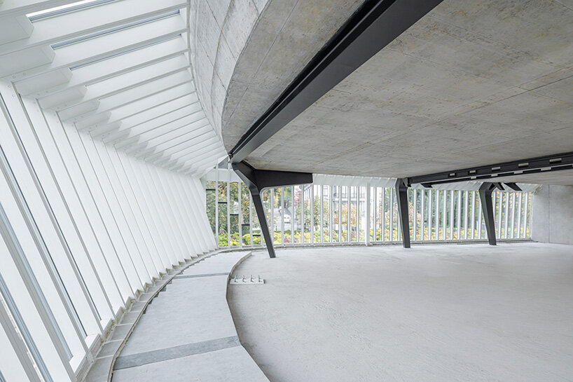 santiago calatrava sculpts haus zum falken in zurich with folded glass facade