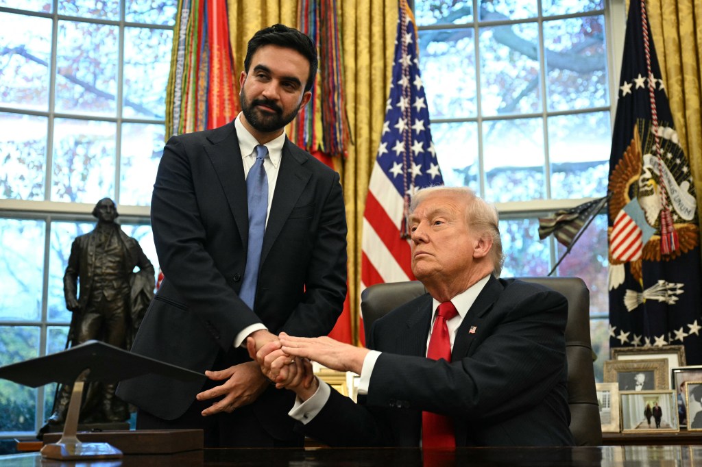 Donald Trump shaking hands with Zohran Mamdani in the Oval Office.