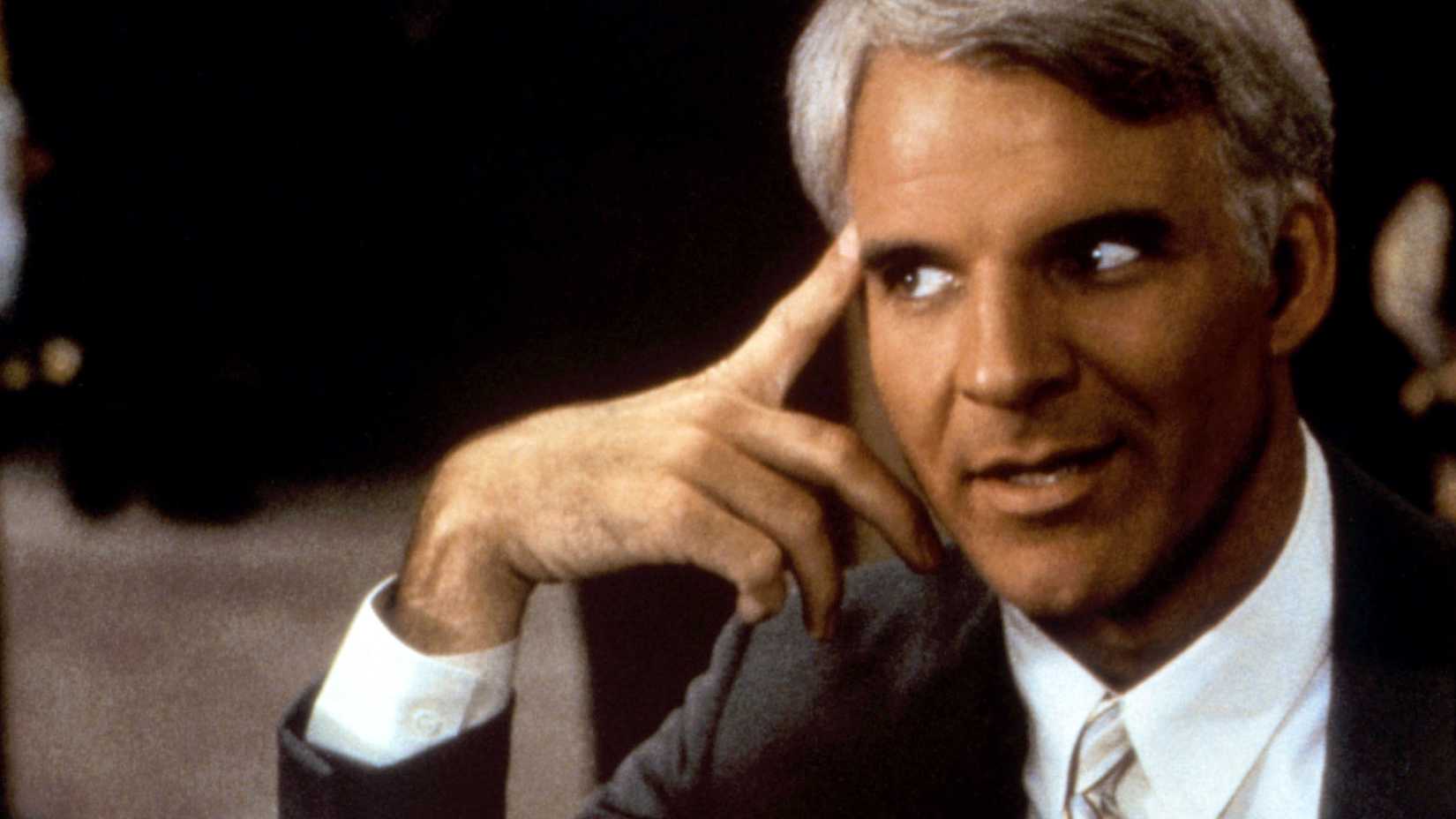 Steve Martin points to his head in All of Me