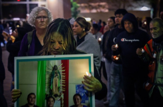 Worshipers march around the Fedral Courthouse during a vigil for immigrants held in ICE detiontion on Thursday, Nov. 13, 2025 in Downtown. Catholic, Jewish, Unitarian Universalist, Methodist, and multi-faith leaders shared prayers and reflections calling to protect immigrants, to stand with the stranger, and to call out injustice in our community.(Photo by Sandy Huffaker for The San Diego Union-Tribune)