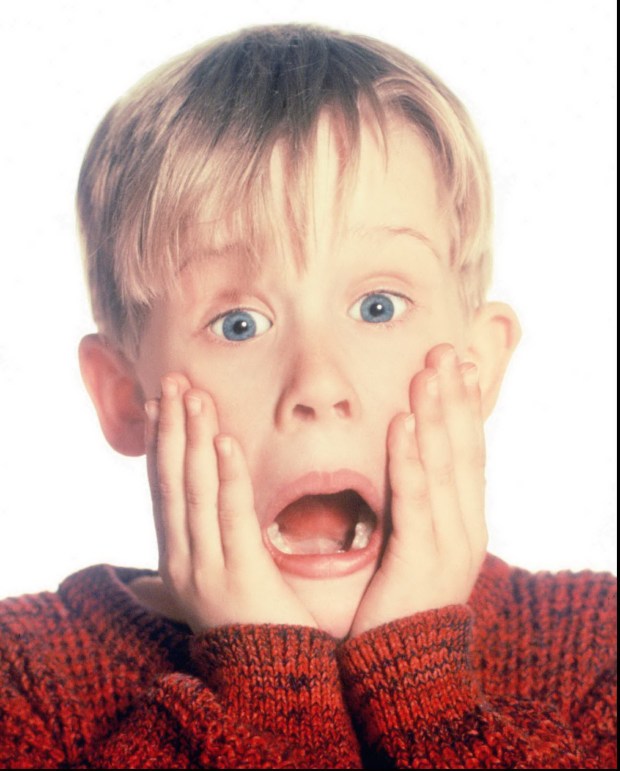Macauley Culkin in the 1990 John Hughes film "Home Alone." Culkin, now 45, will reminisce on the making of the film at a 35th anniversary screening Nov. 25 at the San Diego Civic Theatre. NBC