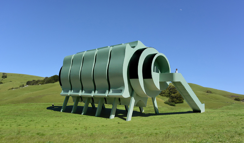 five rotating modules reconfigure to form interactive segmented house of the future