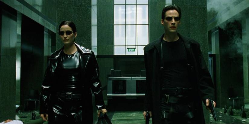 Keanu Reeves as Neo and Carrie-Anne Moss as Trinity in The Matrix (1999)