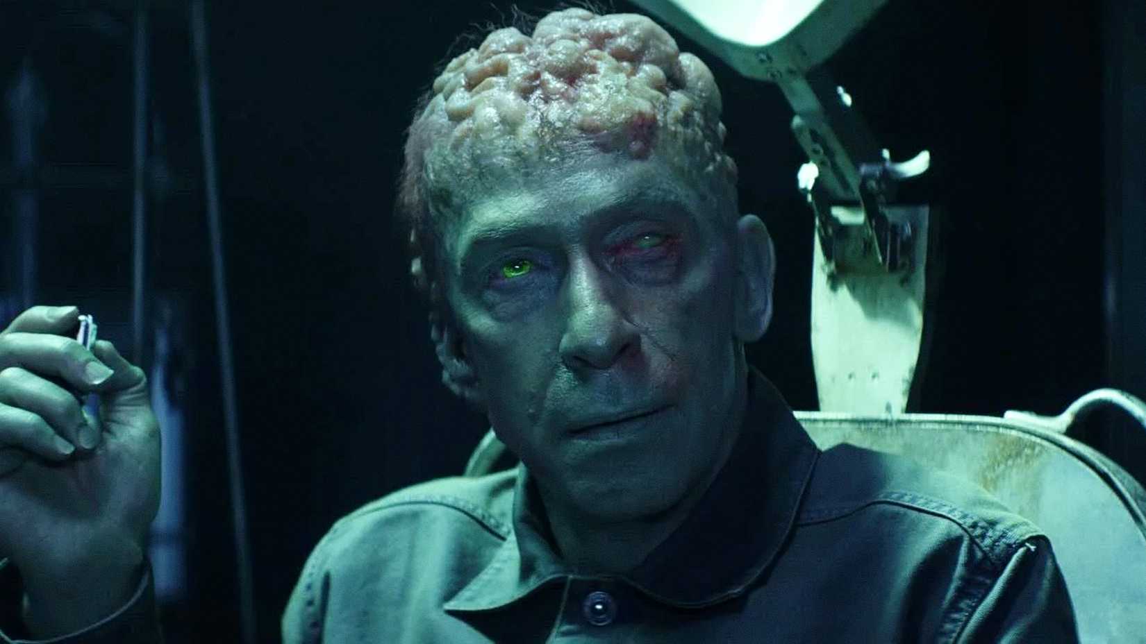 Tim Blake Nelson's Samuel Sterns reveals his green appearance in a prison cell in Captain America Brave New World