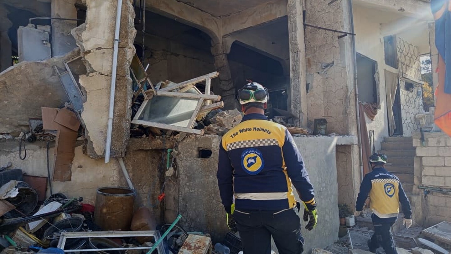 Israeli forces in southern Syria open fire, killing 13, officials and residents say