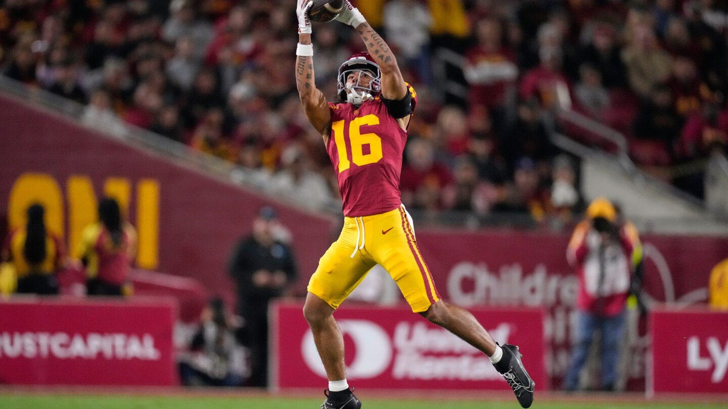 No. 20 USC pulls off fake punt after the Trojans' 3rd-string QB switches to punter's uniform number
