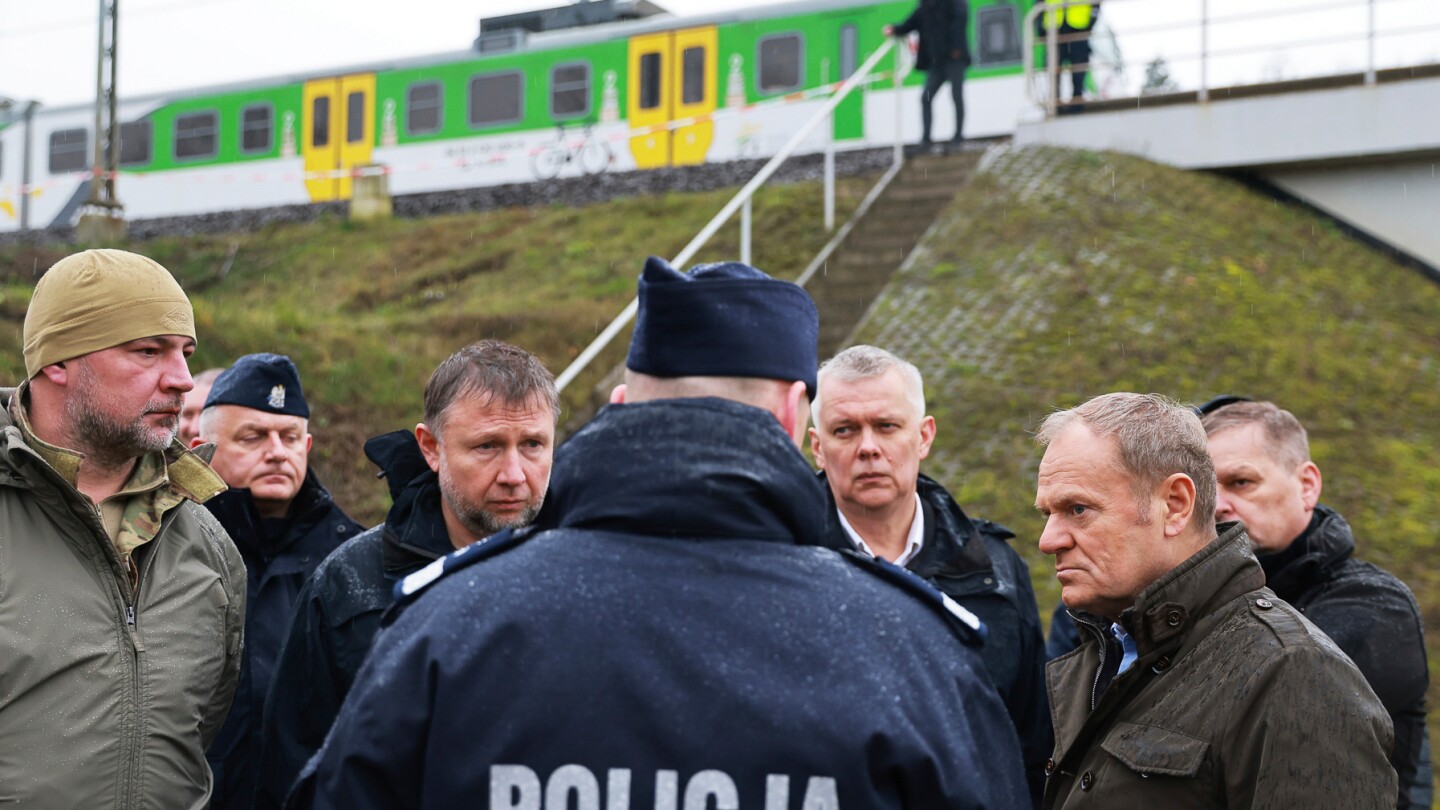 Poland says 2 Ukrainians working for Russia are suspected in railway track blast