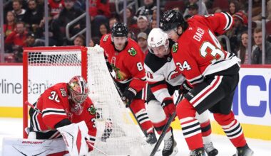 Undermanned, sluggish Blackhawks scrape out point in overtime loss to Devils
