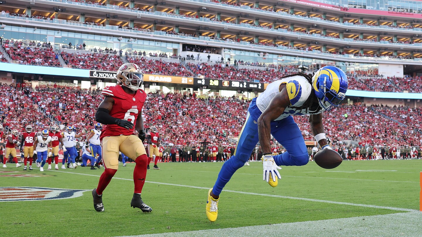 Davante Adams questionable to return with back injury