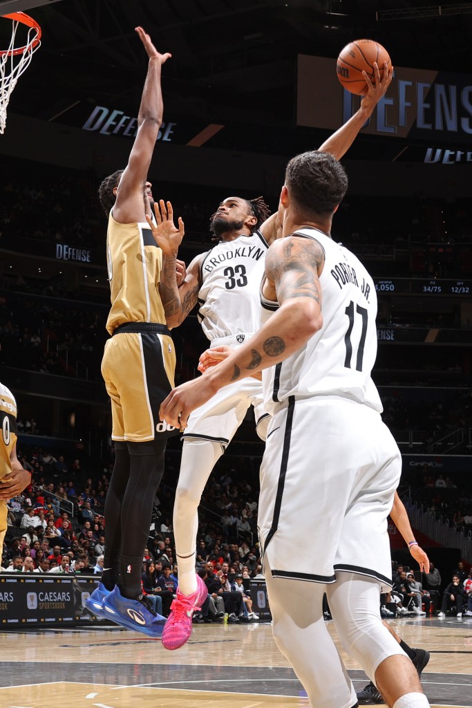 Nic Claxton #33 of the Brooklyn Nets drives to the basket during the game against the Washington Wizards on Nov. 16, 2025.