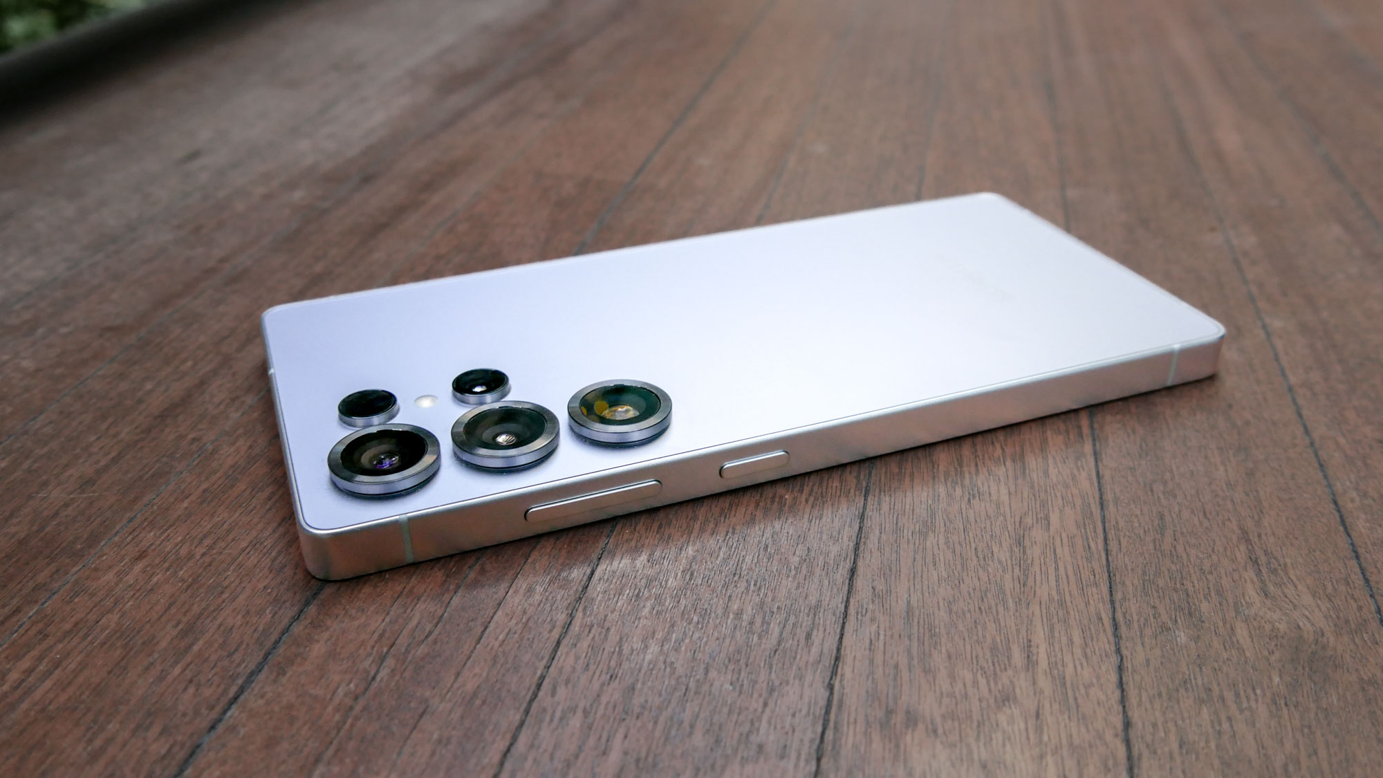 A Galaxy S25 Ultra face down on a table.