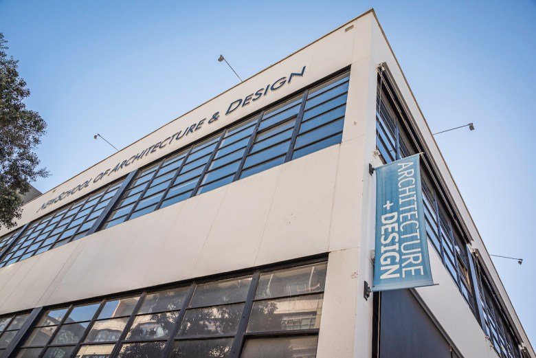 The NewSchool of Architecture and Design's old building  on a quiet block in the East Village with an aging banner out front.